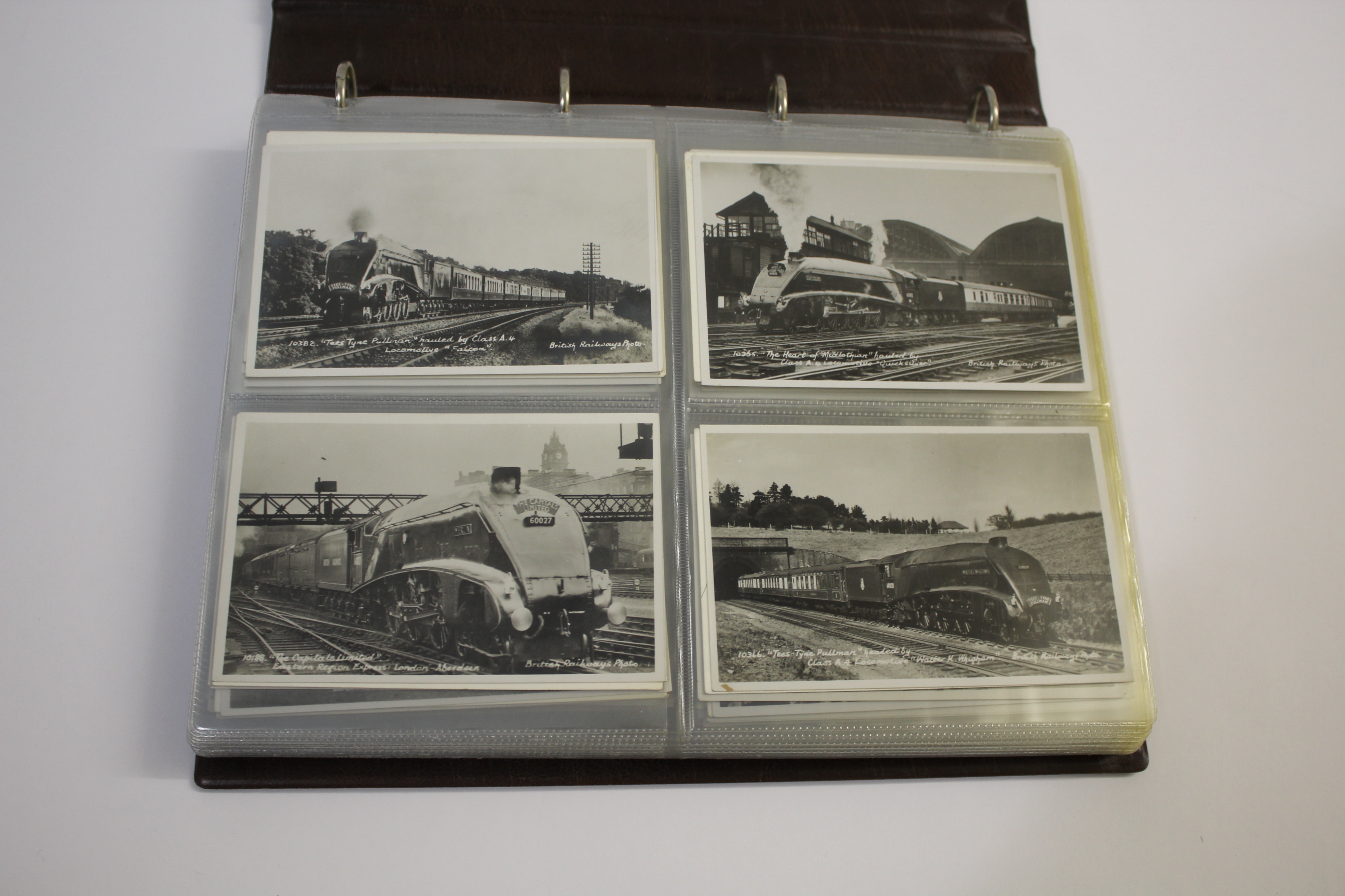 RAILWAY POSTCARDS & BOOKS 1 album including various railway locomotive postcards, Tees Tyne Pullman,