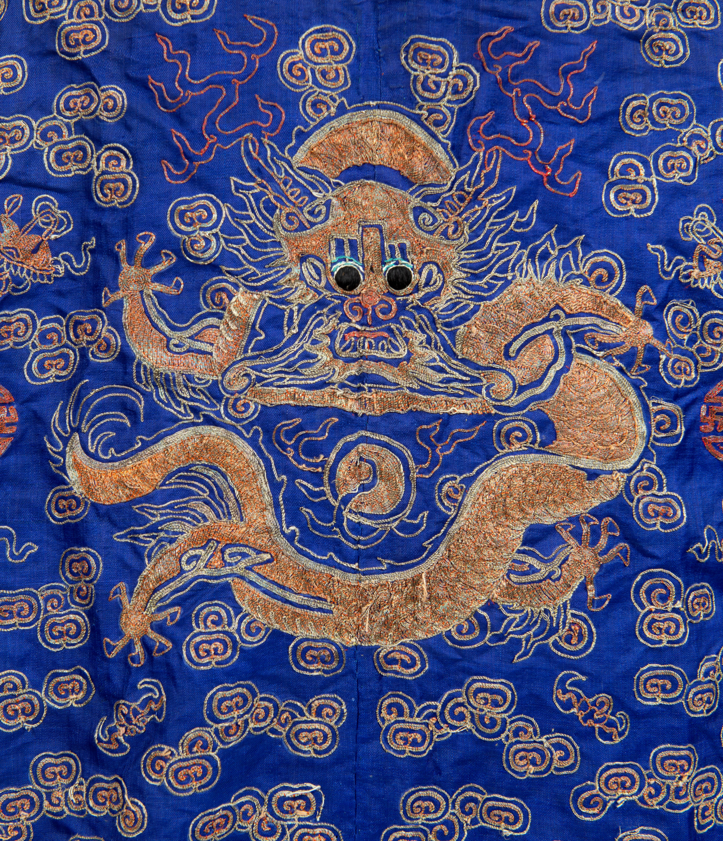 19THC CHINESE DRAGON ROBE a late 19thc unlined blue silk Chinese Dragon robe, worked with couched - Image 2 of 5