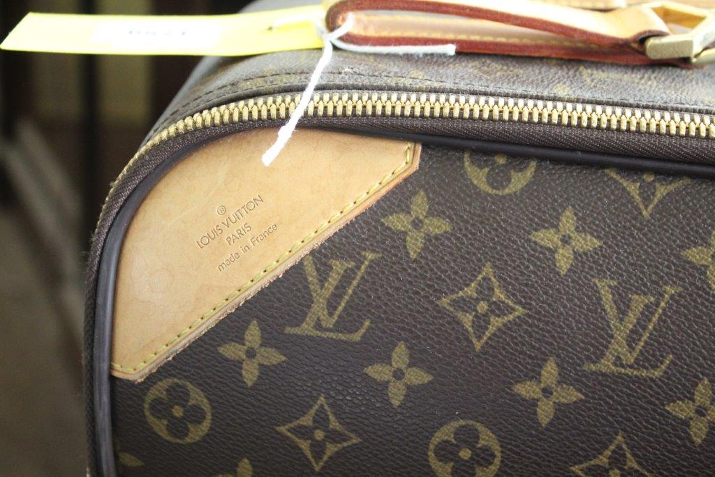 LOUIS VUITTON SUITCASE a large suitcase with monogrammed exterior and leather handles and strap, - Image 4 of 15