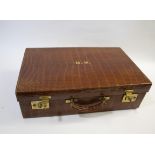 UNUSUAL CROCODILE FITTED SUITCASE - ASPREY a crocodile skin suitcase with brass catches and lock