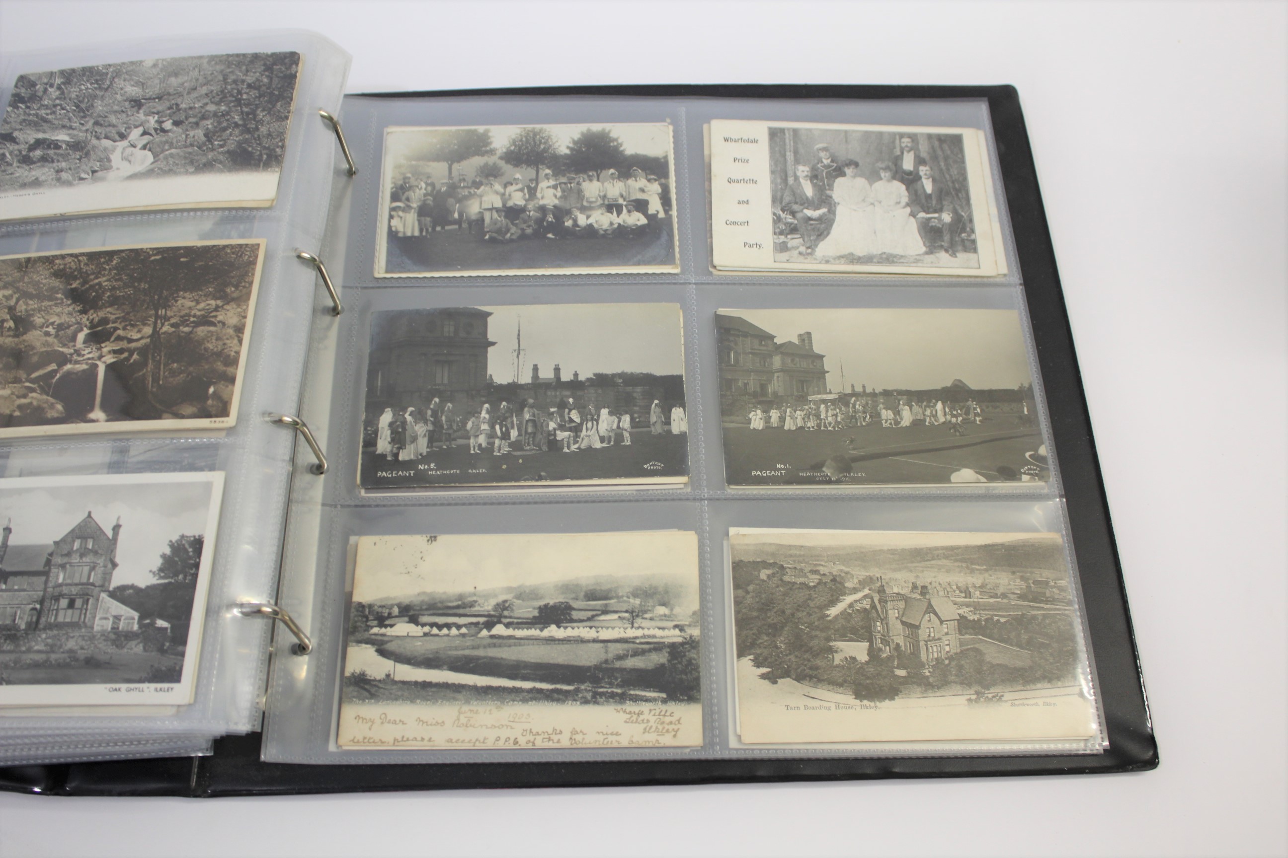 LARGE POSTCARD ALBUM of GB cards, including Boston Spa, Railway disaster near Barnsley, Railway