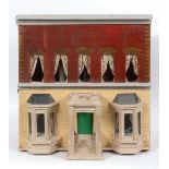 ANTIQUE DOLLS HOUSE 2 two storey dolls house with brick facade to the top floor, with an opening