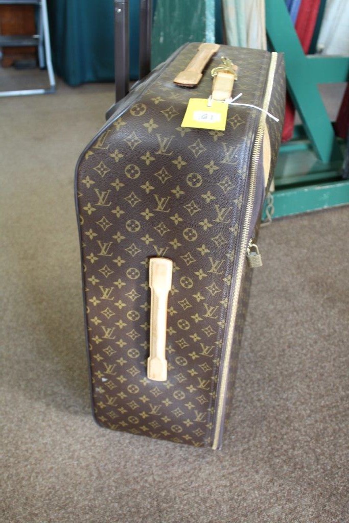 LOUIS VUITTON SUITCASE a large suitcase with monogrammed exterior and leather handles and strap, - Image 7 of 15