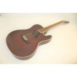 UNUSUAL TENNESSEE GUITAR an unusual 6 string fretless electro acoustic guitar with volume controls