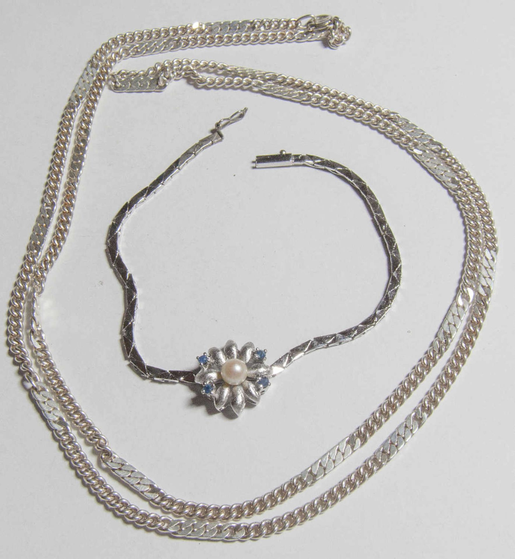 1 Kette und 1 Armband, Silber. Gewicht ca. 28,9 gr1 necklace and 1 bracelet, silver. Weight