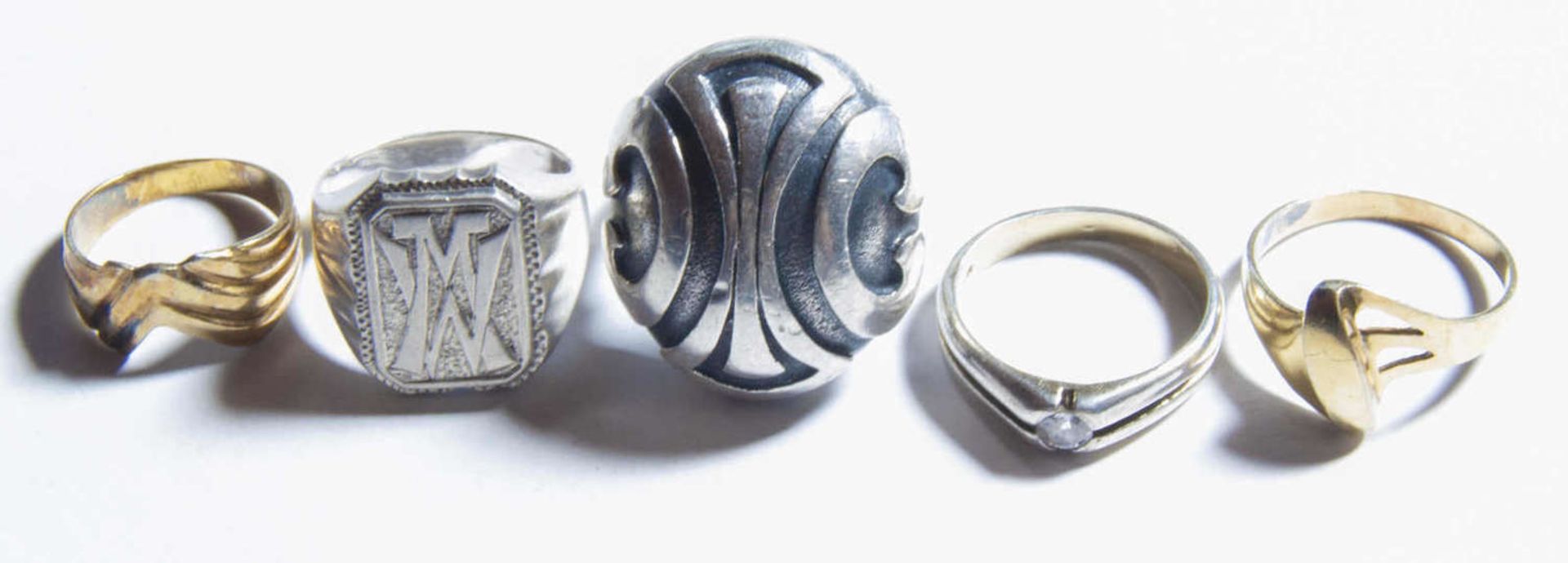 5 Silberringe, teilweise vergoldet, verschiedene Modelle. Gewicht ca. 36,7 gr5 silver rings,