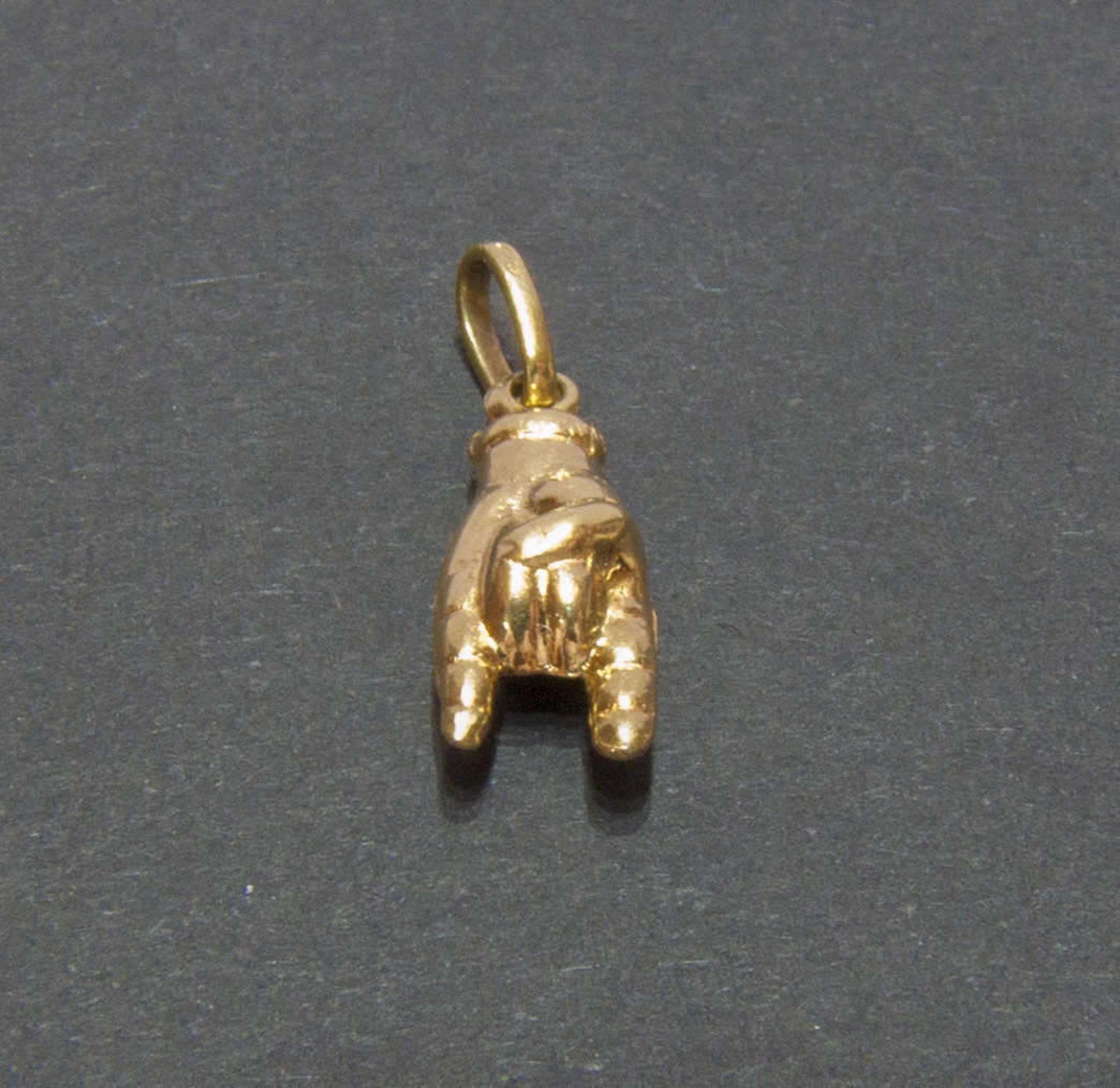 Anhänger "Hand", 750er Gelbgold, Gewicht ca. 1,1 gr.Pendant "hand", 750 yellow gold, weight