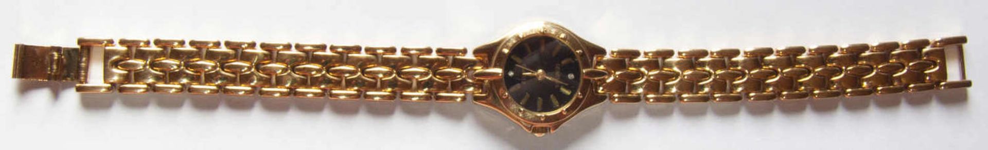 Damen - Armbanduhr, Geneves Quarz. Schwarzes Ziffernblatt. Auf der 12 und der 6 jeweils ein weißer