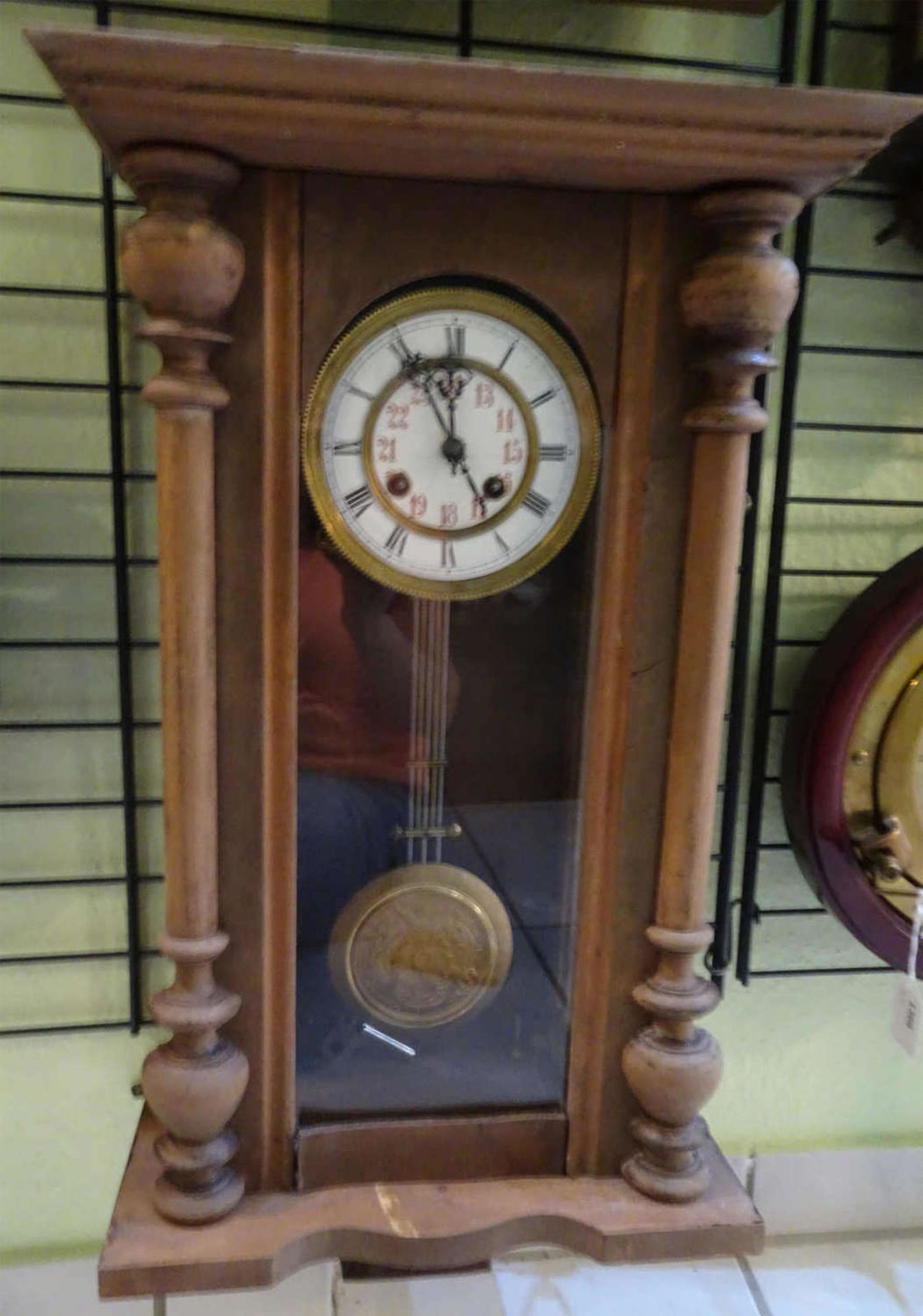 Wanduhr um 1880, Schlag auf Feder. Breite ca. 36 cm, Höhe ca. 70 cmWall clock around 1880, blow on