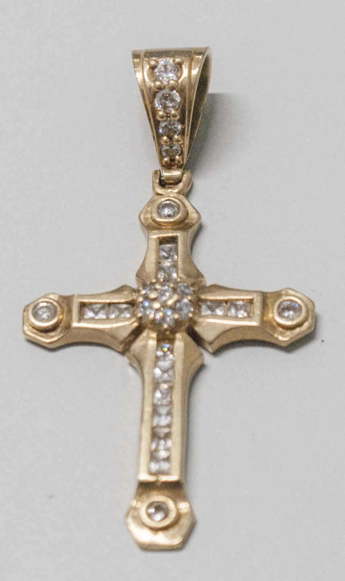 Anhänger "Kreuz", 10 K Gelbgold (417er), besetzt mit zahlreichen Zirkonia. Länge ca 6,5cm, Gewicht