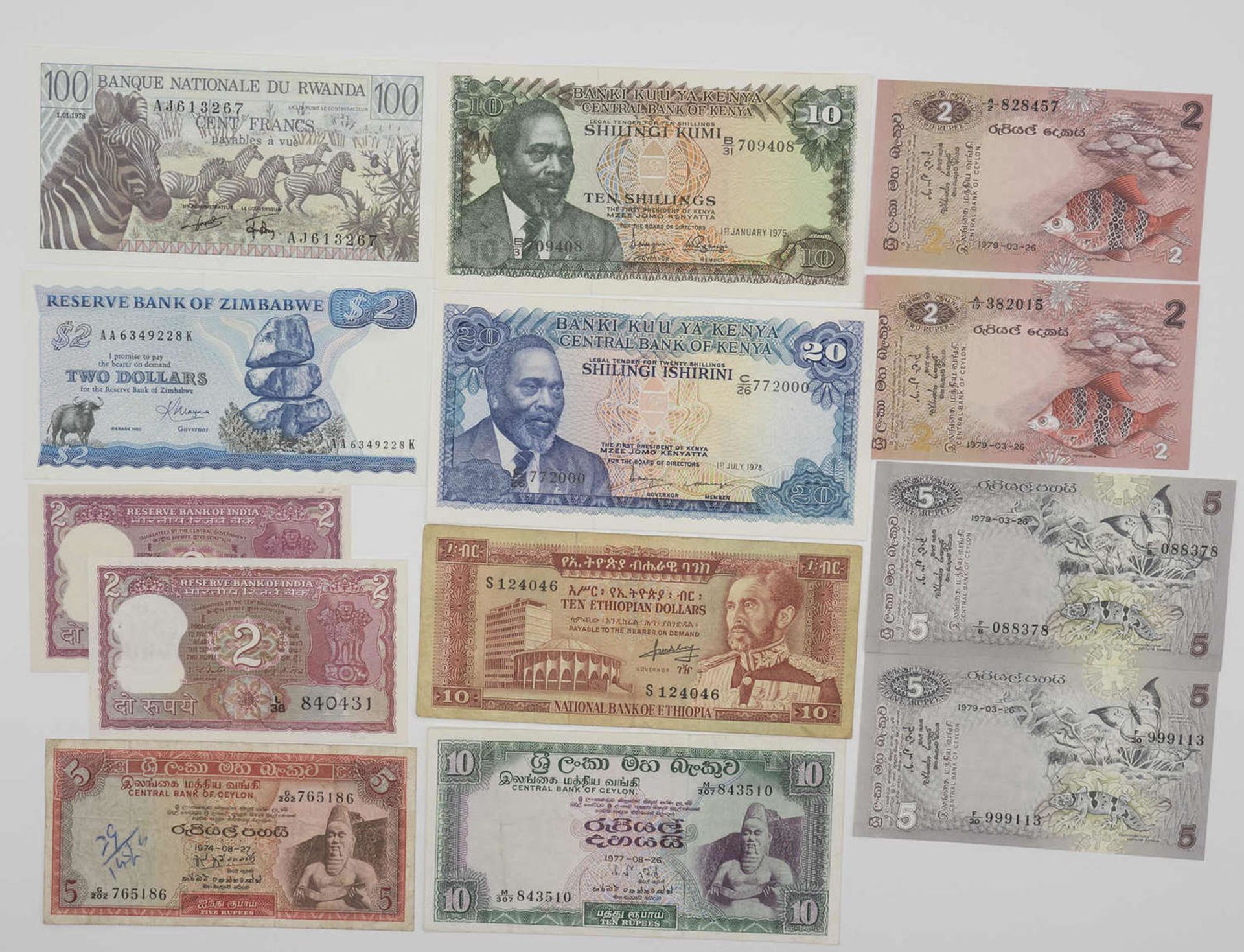 Konvolut Banknoten Asien/Afrika, bestehend aus: 2 x Indien 2 Rupees, unc., Sri Lanka (Ceylon) 2 x