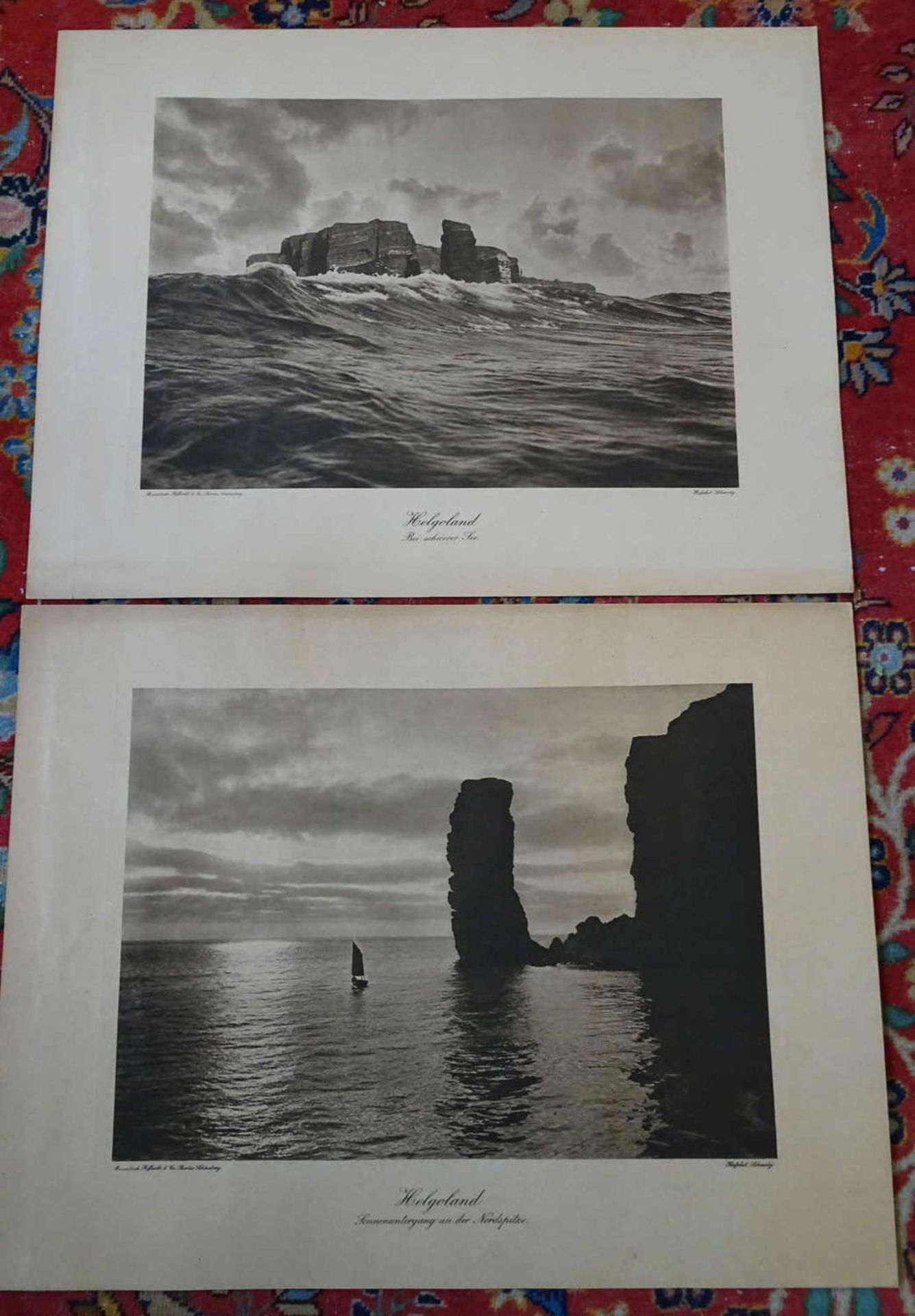 2 großformatige alte Drucke; 1 x Helgoland, Sonnenuntergang an der Nordspitze, links bezeichnet