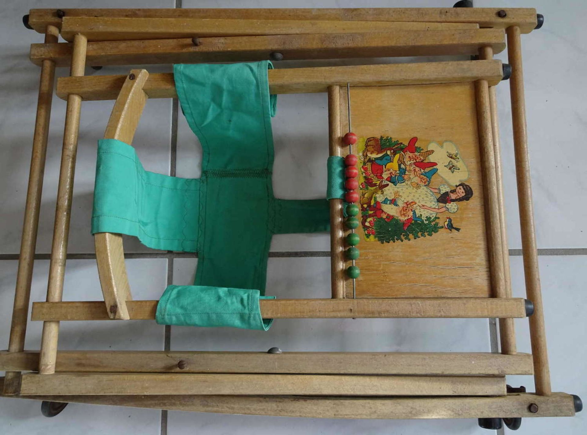 Wooden walker with snow white motif, collapsible. Approximately 50s-60s.