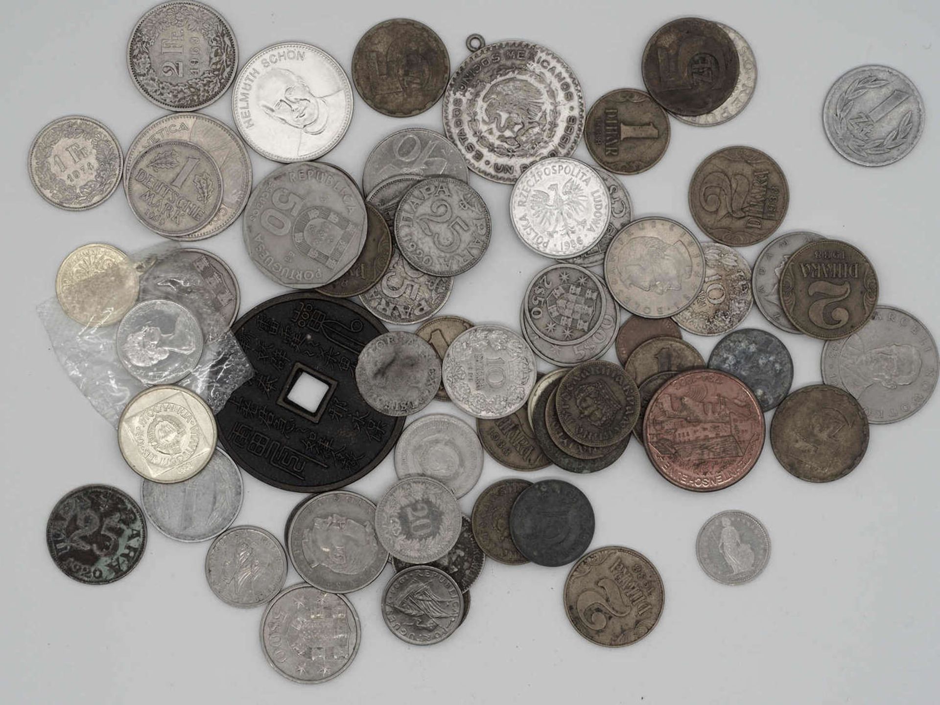 Lot of coins from around the world. Please visit