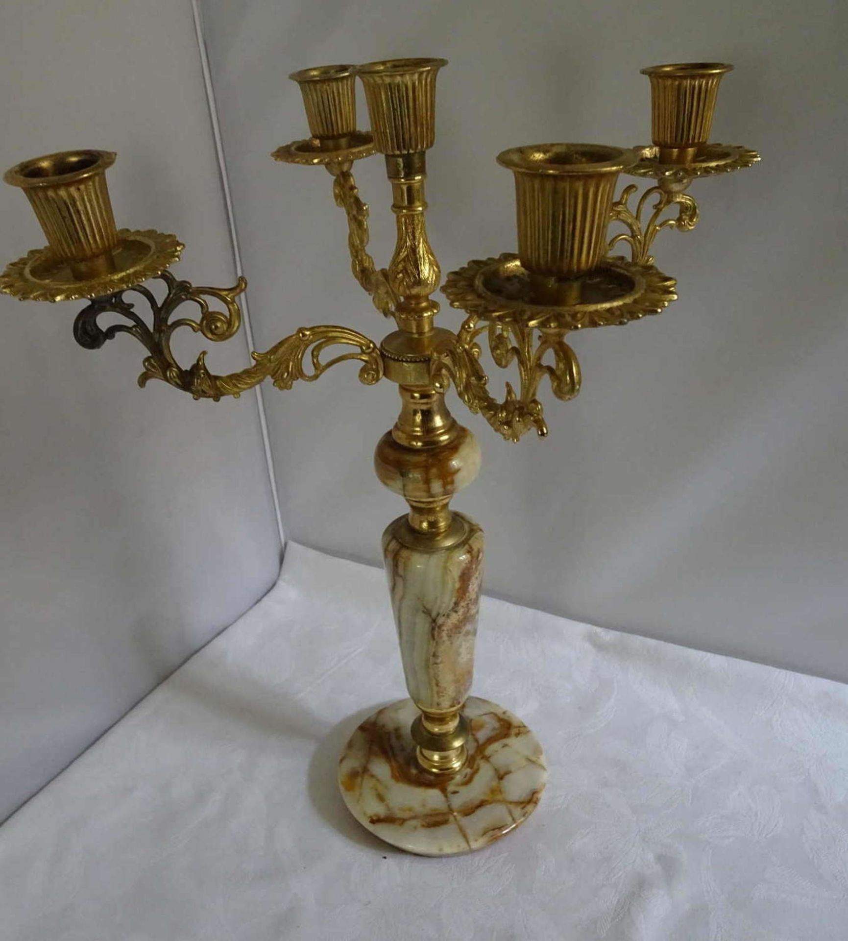 5-flame candlestick, golden, with marble base. Height about 37 cm. Good condition.