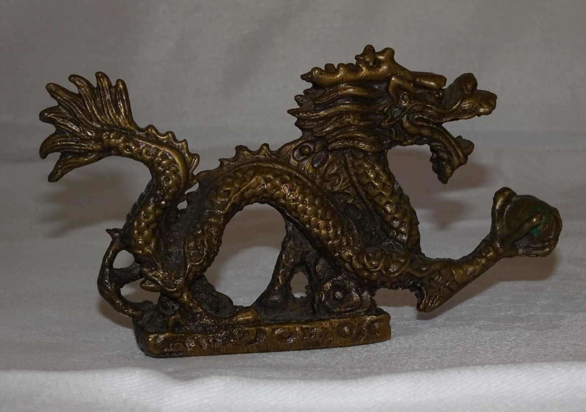 Chinese lucky dragon made of brass. Length about 10.5 cm