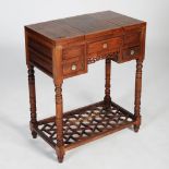 A Chinese dark wood dressing table, early 20th century, the rectangular top with two hinged flaps