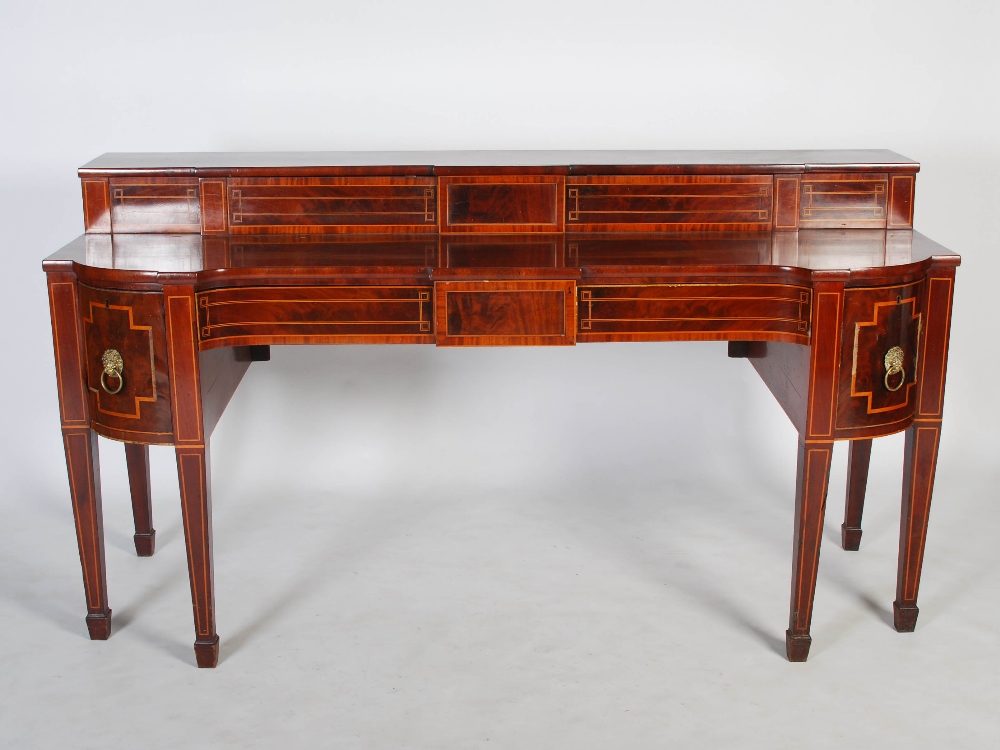 A 19th century Scottish mahogany sideboard, the upright stage back with two sliding cupboard