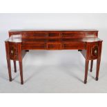 A 19th century Scottish mahogany sideboard, the upright stage back with two sliding cupboard