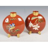 A pair of late 19th century Mintons Aesthetic Movement pottery moon flasks, decorated in coloured