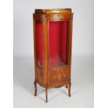 A late 19th/early 20th century French Transitional style vitrine, the rectangular top with pierced