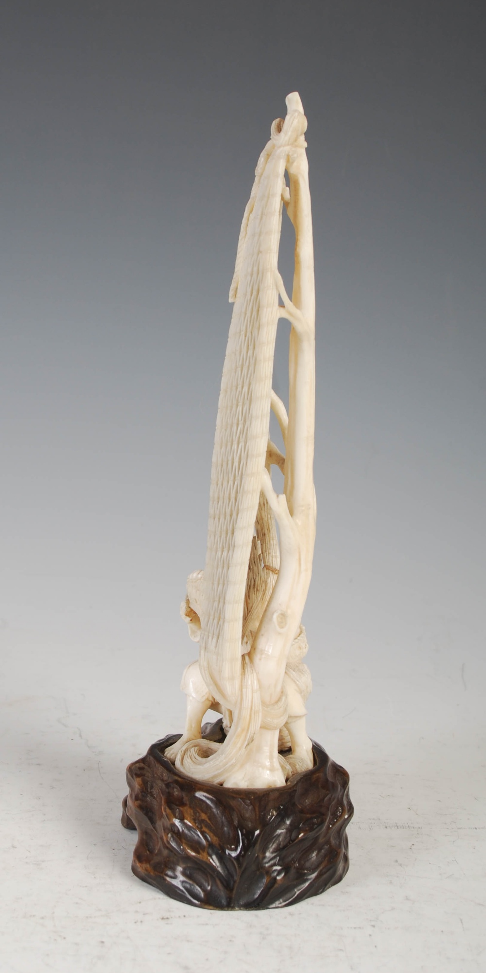 A Japanese ivory okimono of a fisherman tending net, Meiji Period, on carved wood stand, overall - Image 2 of 9
