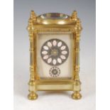 A late 19th/ early 20th century French brass repeating carriage clock with alarm retailed by McKay &