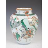 A Chinese porcelain famille verte jar, late 19th/ early 20th century, decorated with figures in a