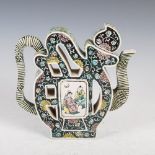 A Chinese porcelain famille verte wine ewer, Qing Dynasty, decorated with rectangular shaped