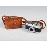 A mid 20th century Mikroma Meopta Mirar miniature spy camera No. 4313627, with original leather