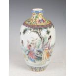 A Chinese porcelain famille rose vase, late Qing/ Republican Period, decorated with figures in a