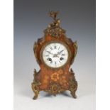 A late 19th century French rosewood and marquetry inlaid mantle clock in the Louis XV style, the