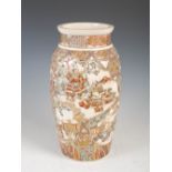 A Japanese Satsuma pottery vase, Meiji Period, decorated with shaped panels enclosing figures of