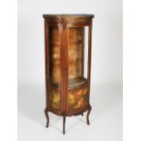 A late 19th/early 20th century French mahogany and gilt metal mounted Transitional style vitrine,