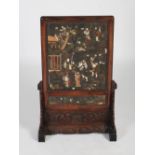 A Chinese dark wood and stone decorated table screen, Qing Dynasty, the rectangular screen decorated