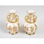 A pair of miniature Japanese Satsuma pottery twin handled vases, Meiji Period, both decorated with a