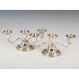 A pair of 20th century silver three light candelabra, Birmingham, 1957, makers mark of Adie