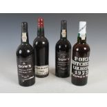 Four bottles of vintage port, comprising; one bottle of Cockburn's Vintage Port 1963, two bottles of