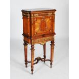 A late 19th century French kingwood and gilt metal mounted writing cabinet on stand, the shaped