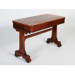 A 19th century rosewood and boxwood lined library table, the rounded rectangular top with line and