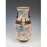 A Chinese porcelain famille rose crackle glazed vase, Qing Dynasty, decorated with warriors, the