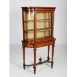 A late 19th century satinwood, marquetry and gilt metal mounted cabinet on stand, the shaped