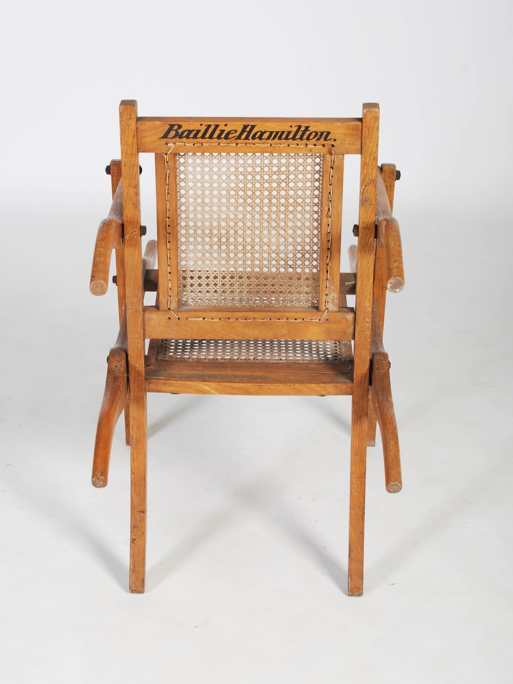 An early 20th century folding bathing chair, with cane work back and seat, the reverse inscribed ' - Image 5 of 6