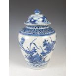 A Japanese Arita blue and white porcelain jar and matched cover, Edo Period, the jar decorated