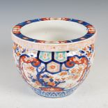 A Japanese Imari jardiniere, late 19th/ early 20th century, decorated with oval and fan shaped