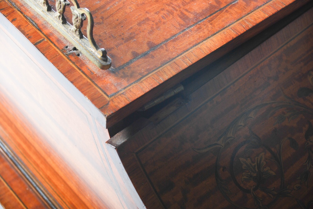 A late 19th century satinwood and marquetry inlaid desk by Maple & Co., the rectangular top with - Image 14 of 14