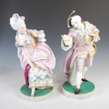 A pair of late 19th/ early 20th century bisque porcelain figure groups, modelled as an 18th