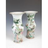 A pair of Chinese porcelain Yen Yen vases, late Qing Dynasty, decorated with long tailed birds and