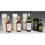 Four boxed bottles of Islay Single Malt Scotch Whisky, comprising; two Bowmore Legend, 700ml., 40%