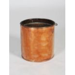 A 19th century copper pail, of cylindrical shape with roll over rim, 31.5cm diameter x 31cm high.